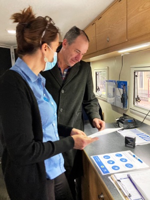 A person receives support and specialist advice from a visiting health professional at Hutt St Centre.